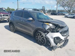 2017 Kia Sportage EX z VIN KNDPN3AC7H7233998, wystawiony jako IAAI lot #41588712 z przebiegiem 137 819 mil mil oraz . Historia ofert i sprzedaży dostępna na DreamBid. Obrazek 1.