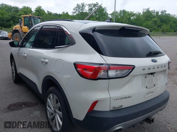 2021 Ford Escape Titanium with VIN 1FMCU9J93MUA36648, listed as a IAAI auction lot 42055229 with 122,864 mi miles and . Bid and sale history available at carsss.com. Image 3.