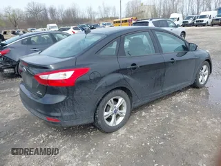 2013 Ford Focus SE with VIN 1FADP3F25DL211678, listed as a IAAI auction lot 42160699 with 193,272 mi miles. Bid and sale history available at carsss.com. Image 4.