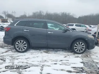 2014 Mazda CX-9 Grand Touring with VIN JM3TB3DV9E0440506, listed as a IAAI auction lot 41537718 with 217,299 mi miles and . Bid and sale history available at DreamBid. Image 13.