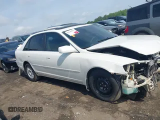 2001 Toyota Avalon XL z VIN 4T1BF28B71U166532, wystawiony jako IAAI lot #42149996 z przebiegiem 172 698 mil mil oraz . Historia ofert i sprzedaży dostępna na DreamBid. Obrazek 12.