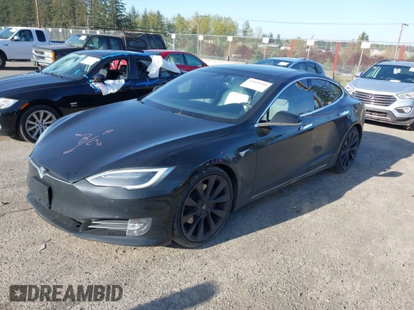 2018 Tesla Model S 75D with VIN 5YJSA1E28JF273809, listed as a IAAI auction lot 42029434 with 85,972 mi miles and . Bid and sale history available at DreamBid. Image 20.