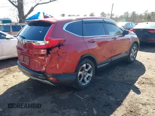 2018 Honda CR-V EX with VIN 2HKRW2H57JH604764, listed as a IAAI auction lot 41935099 with 156,459 mi miles and . Bid and sale history available at DreamBid. Image 4.