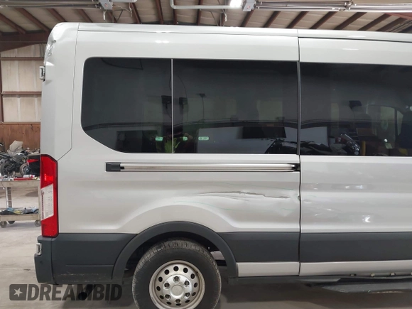 2021 Ford Transit Passenger XL с VIN 1FBAX9CG9MKA15625, выставлен на аукционе IAAI как лот 42491429 с пробегом 99 401 миль миль и . История ставок и продаж доступна на DreamBid. Изображение 18.