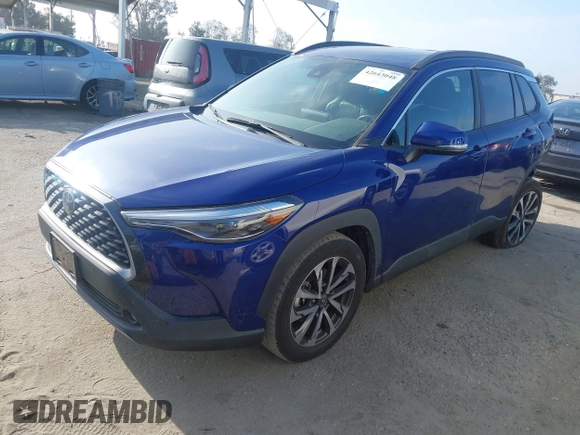 2022 Toyota Corolla Cross XLE with VIN 7MUDAAAG7NV024323, listed as a IAAI auction lot 42643048 with 76,465 mi miles and . Bid and sale history available at DreamBid. Image 18.