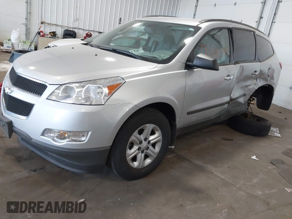 2012 Chevrolet Traverse LS z VIN 1GNKREED9CJ355181, wystawiony jako IAAI lot #42190745 z przebiegiem 94 177 mil mil oraz . Historia ofert i sprzedaży dostępna na DreamBid. Obrazek 17.