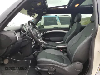 2007 MINI Hardtop with VIN WMWMF33567TT56922, listed as a Copart auction lot 56598665 with 66,605 mi miles and Salvage title. Bid and sale history available at DreamBid. Image 7.
