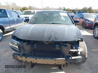 2019 Dodge Charger SXT with VIN 2C3CDXJG4KH710673, listed as a IAAI auction lot 41469797 with 102,011 mi miles and . Bid and sale history available at DreamBid. Image 13.