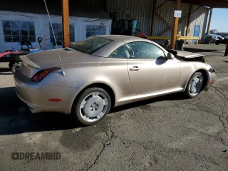2002 Lexus SC 430 z VIN JTHFN48Y520005046, wystawiony jako Copart lot #49508605 z przebiegiem 126 933 mil mil oraz Szkody całkowita. Historia ofert i sprzedaży dostępna na DreamBid. Obrazek 3.