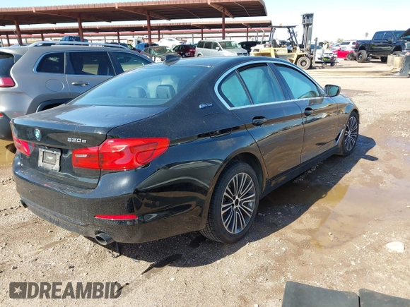 2019 BMW 5 Series 530e iPerformance with VIN WBAJA9C55KB392765, listed as a IAAI auction lot 41748610 with 60,834 mi miles. Bid and sale history available at carsss.com. Image 4.
