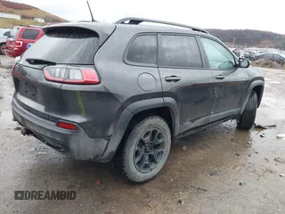 2022 Jeep Cherokee X with VIN 1C4PJMCX4ND525297, listed as a IAAI auction lot 41519912 with 42,691 mi miles. Bid and sale history available at carsss.com. Image 4.