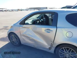 2014 Scion iQ with VIN JTNJJXB02EJ027026, listed as a IAAI auction lot 42619439 with 103,261 mi miles and . Bid and sale history available at DreamBid. Image 14.