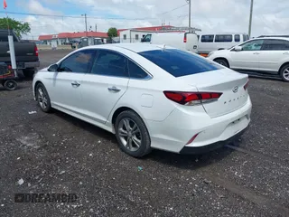 2018 Hyundai Sonata SEL with VIN 5NPE34AF9JH670688, listed as a IAAI auction lot 42115485 with 148,519 mi miles and . Bid and sale history available at carsss.com. Image 3.