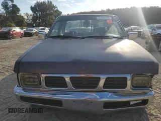 1996 Nissan Frontier XE z VIN 1N6SD16S4TC308641, wystawiony jako Copart lot #77328574 z przebiegiem Nie podano mil oraz Szkoda całkowita • Salvage title. Historia ofert i sprzedaży dostępna na DreamBid. Obrazek 5.