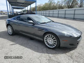 2007 Aston Martin DB9 z VIN SCFAD01A77GA07808, wystawiony jako Copart lot #48063115 z przebiegiem 53 195 mil mil oraz Szkody całkowita. Historia ofert i sprzedaży dostępna na DreamBid. Obrazek 4.