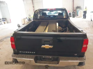 2017 Chevrolet Silverado 1500 LT with VIN 1GCVKREC8HZ110471, listed as a IAAI auction lot 41989681 with 148,353 mi miles and . Bid and sale history available at DreamBid. Image 16.
