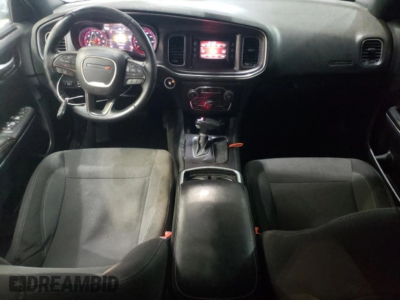 2015 Dodge Charger SE z VIN 2C3CDXBG6FH848445, wystawiony jako Copart lot #54825915 z przebiegiem 121 764 mil mil oraz Szkoda całkowita • Salvage title. Historia ofert i sprzedaży dostępna na DreamBid. Obrazek 8.