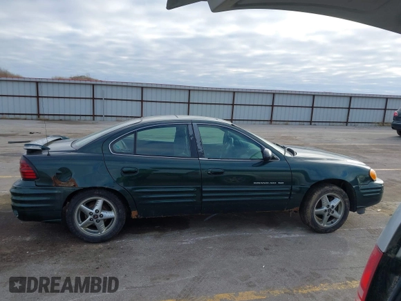 2002 Pontiac Grand Am SE1 z VIN 1G2NF52FX2C165546, wystawiony jako IAAI lot #41290065 z przebiegiem 149 834 mil mil oraz . Historia ofert i sprzedaży dostępna na DreamBid. Obrazek 12.