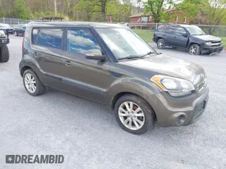 2012 Kia Soul + with VIN KNDJT2A63C7355735, listed as a IAAI auction lot 42041895 with 182,296 mi miles. Bid and sale history available at carsss.com. Image 1.