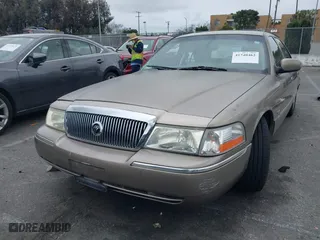 2004 Mercury Grand Marquis LS Premium with VIN 2MEFM75W44X604564, listed as a IAAI auction lot 41740462 with 119,693 mi miles. Bid and sale history available at carsss.com. Image 18.