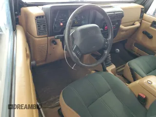 1998 Jeep Wrangler Sahara z VIN 1J4FY49S4WP728476, wystawiony jako Copart lot #53490515 z przebiegiem 272 058 mil mil oraz Czysty tytuł • Clean title. Historia ofert i sprzedaży dostępna na DreamBid. Obrazek 8.