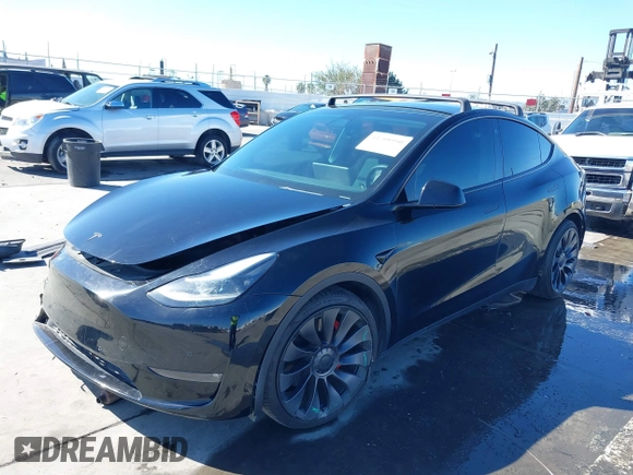 2021 Tesla Model Y Performance with VIN 5YJYGDEF9MF251738, listed as a IAAI auction lot 41708950 with 61,248 mi miles and . Bid and sale history available at DreamBid. Image 21.