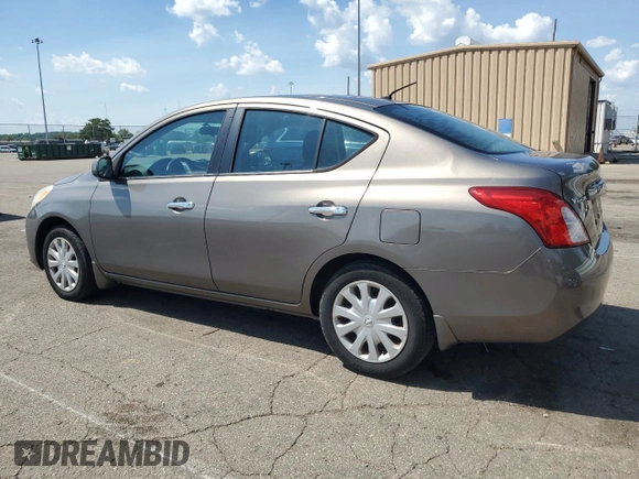 2012 Nissan Versa SV with VIN 3N1CN7AP7CL930619, listed as a Copart auction lot 63657855 with 106,911 mi miles and Salvage title. Bid and sale history available at DreamBid. Image 2.