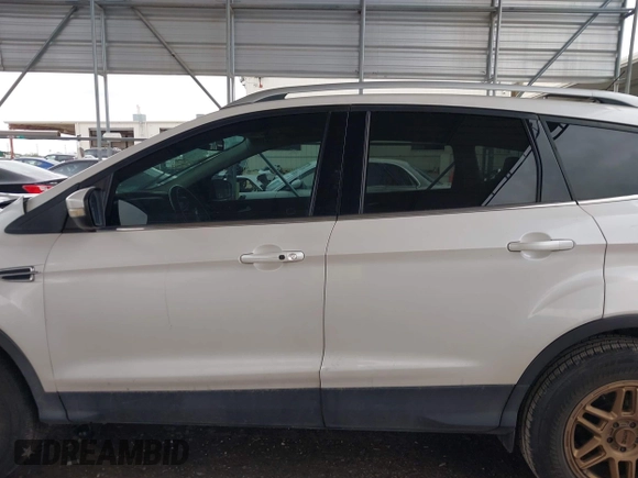 2015 Ford Escape Titanium z VIN 1FMCU0J91FUA27610, wystawiony jako IAAI lot #42095995 z przebiegiem 122 521 mil mil oraz . Historia ofert i sprzedaży dostępna na DreamBid. Obrazek 15.