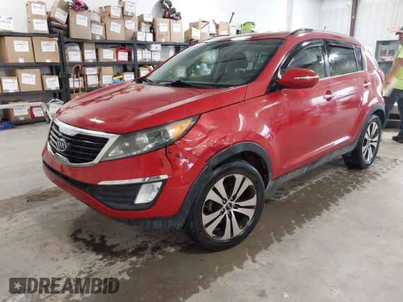 2011 Kia Sportage EX with VIN KNDPC3A29B7013959, listed as a IAAI auction lot 42196494 with 103,850 mi miles and . Bid and sale history available at carsss.com. Image 2.
