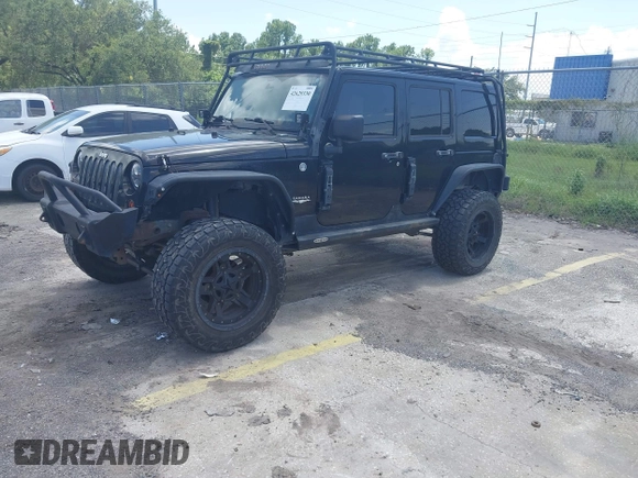 2012 Jeep Wrangler Unlimited Altitude with VIN 1C4HJWEG5CL161049, listed as a IAAI auction lot 42629330 with 217,147 mi miles and . Bid and sale history available at DreamBid. Image 17.