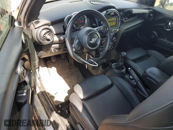 2015 MINI Hardtop with VIN WMWXM5C5XFT974077, listed as a Copart auction lot 58063965 with 93,853 mi miles and Salvage title. Bid and sale history available at DreamBid. Image 8.