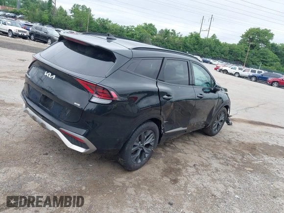 2023 Kia Sportage SX-Prestige with VIN KNDPXCAG3P7077955, listed as a IAAI auction lot 42456463 with 24,699 mi miles and . Bid and sale history available at DreamBid. Image 4.