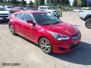 2016 Hyundai Veloster with VIN KMHTC6AD2GU284741, listed as a IAAI auction lot 42108919 with 162,616 mi miles. Bid and sale history available at carsss.com. Image 1.
