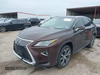 2016 Lexus RX 350 z VIN 2T2ZZMCA5GC029529, wystawiony jako IAAI lot #41953567 z przebiegiem 133 460 mil mil oraz . Historia ofert i sprzedaży dostępna na DreamBid. Obrazek 17.