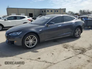 2016 Tesla Model S 70 with VIN 5YJSA1E17GF121312, listed as a Copart auction lot 44736965 with 116,661 mi miles and Salvage title. Bid and sale history available at DreamBid. Image 1.