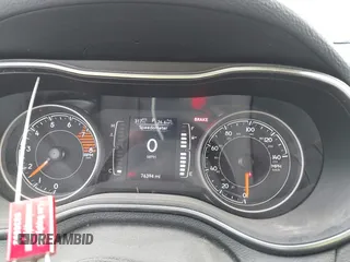 2019 Jeep Cherokee Latitude z VIN 1C4PJLCX8KD313153, wystawiony jako IAAI lot #42608299 z przebiegiem 76 394 mil mil oraz . Historia ofert i sprzedaży dostępna na DreamBid. Obrazek 7.