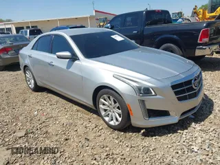 2014 Cadillac CTS Luxury RWD z VIN 1G6AR5S35E0122734, wystawiony jako IAAI lot #41897150 z przebiegiem 127 948 mil mil oraz . Historia ofert i sprzedaży dostępna na DreamBid. Obrazek 1.