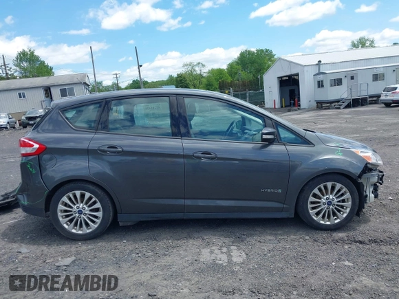 2018 Ford C-Max SE z VIN 1FADP5AU4JL101950, wystawiony jako IAAI lot #42289435 z przebiegiem 218 413 mil mil oraz . Historia ofert i sprzedaży dostępna na DreamBid. Obrazek 13.