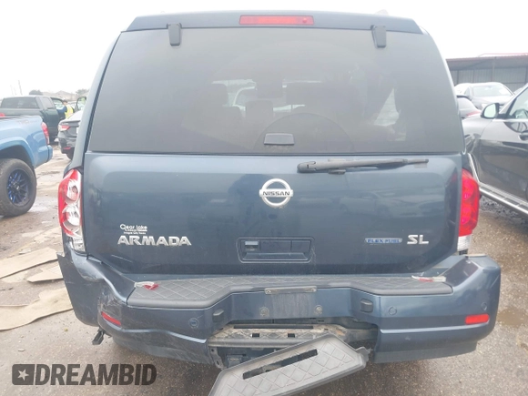 2015 Nissan Armada SV z VIN 5N1BA0ND7FN612818, wystawiony jako IAAI lot #41459324 z przebiegiem 100 326 mil mil oraz . Historia ofert i sprzedaży dostępna na DreamBid. Obrazek 16.