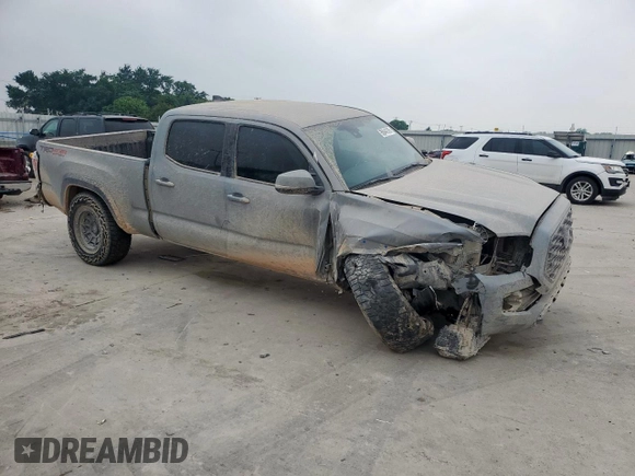 2021 Toyota Tacoma SR5 with VIN 3TMDZ5BN4MM105639, listed as a Copart auction lot 56948395 with Not provided miles and Salvage title. Bid and sale history available at DreamBid. Image 4.