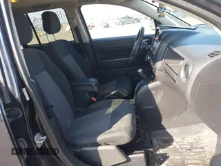 2011 Jeep Compass with VIN 1J4NT1FA7BD208658, listed as a IAAI auction lot 41795085 with 198,880 mi miles. Bid and sale history available at carsss.com. Image 5.
