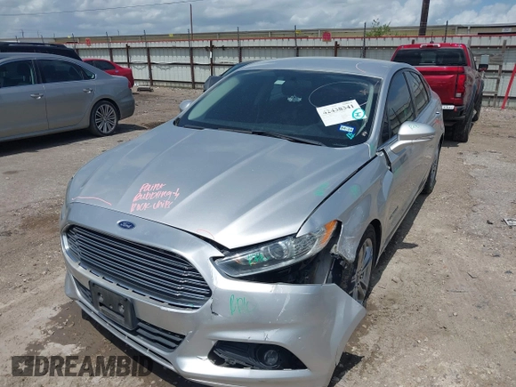 2016 Ford Fusion SE Hybrid z VIN 3FA6P0LU9GR203778, wystawiony jako IAAI lot #42438341 z przebiegiem 130 436 mil mil oraz . Historia ofert i sprzedaży dostępna na DreamBid. Obrazek 16.