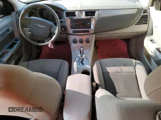 2010 Chrysler Sebring Touring with VIN 1C3CC4FB7AN217431, listed as a Copart auction lot 55181634 with 102,641 mi miles and Salvage Title. Bid and sale history available at DreamBid. Image 8.