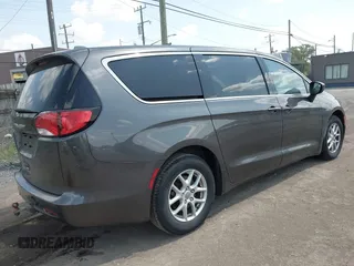 2017 Chrysler Pacifica Touring with VIN 2C4RC1DG1HR571607, listed as a IAAI auction lot 42454025 with 130,601 mi miles and . Bid and sale history available at DreamBid. Image 4.
