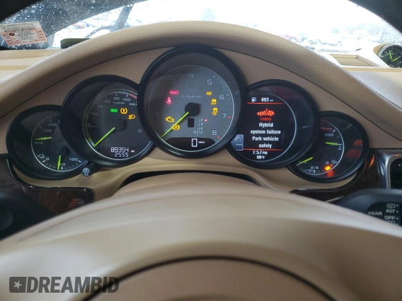 2015 Porsche Panamera S E-Hybrid z VIN WP0AD2A7XFL040092, wystawiony jako Copart lot #85878734 z przebiegiem 89 354 mil mil oraz Tytuł czysty. Historia ofert i sprzedaży dostępna na DreamBid. Obrazek 9.