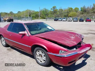 2002 Cadillac Eldorado ESC with VIN 1G6EL12Y72B102153, listed as a IAAI auction lot 41861541 with 91,273 mi miles. Bid and sale history available at carsss.com. Image 1.