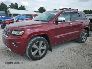 2015 Jeep Grand Cherokee Overland with VIN 1C4RJECG2FC823353, listed as a Copart auction lot 58367395 with 72,117 mi miles and Salvage title. Bid and sale history available at DreamBid. Image 1.