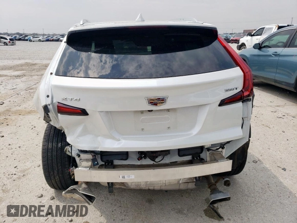 2023 Cadillac XT4 FWD Premium Luxury with VIN 1GYFZCR42PF110122, listed as a Copart auction lot 57332955 with 11,427 mi miles and Salvage title. Bid and sale history available at DreamBid. Image 6.
