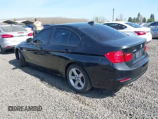 2013 BMW 3 Series 328i xDrive with VIN WBA3B5G58DNS02841, listed as a IAAI auction lot 41924431 with 106,981 mi miles. Bid and sale history available at carsss.com. Image 3.