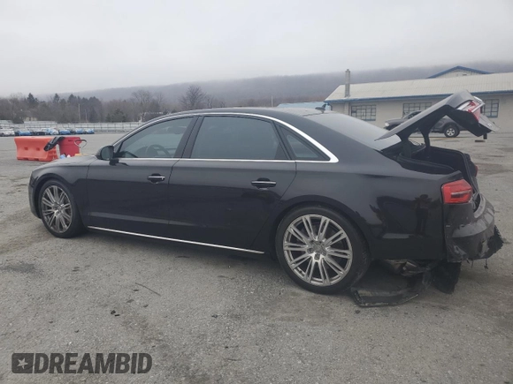 2015 Audi A8 L 3.0T with VIN WAU3GAFD3FN001094, listed as a Copart auction lot 49264345 with 87,184 mi miles and Salvage Title. Bid and sale history available at carsss.com. Image 2.